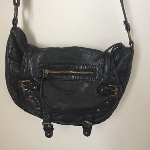 Black faux leather cross body purse.
